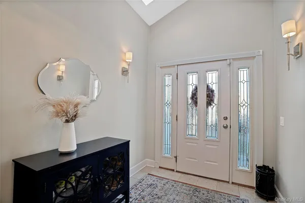 a view of hall way with mirror