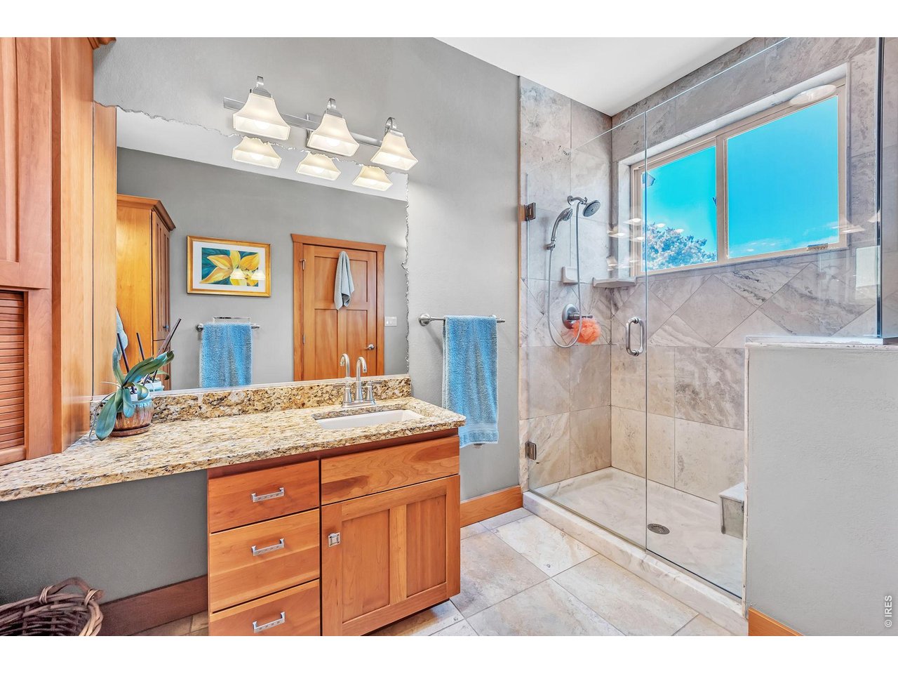 3237 Romnes Road Fort Garland, CO 81133 - Photo 20 of 42 a bathroom with a granite countertop sink mirror and double