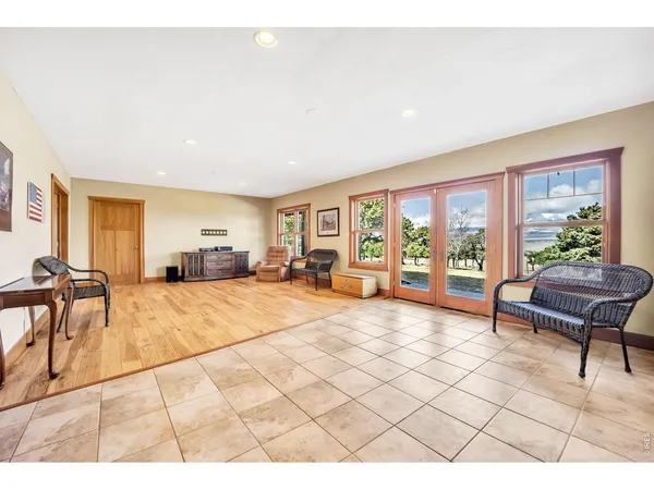a living room with furniture and a table