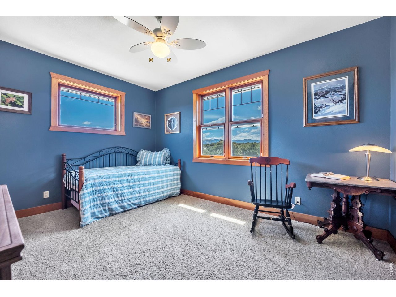 3237 Romnes Road Fort Garland, CO 81133 - Photo 29 of 42 a bedroom with furniture and a window