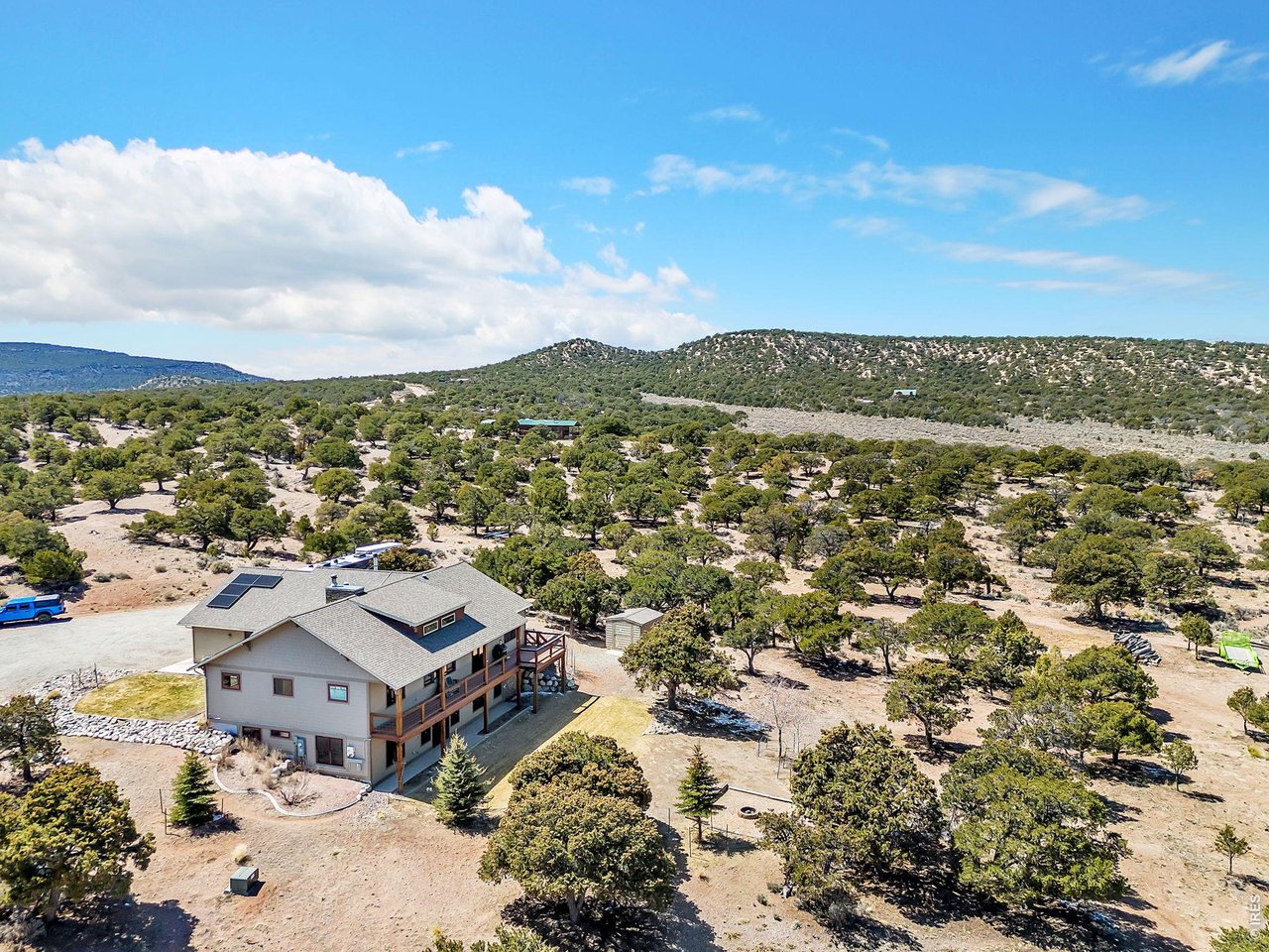 3237 Romnes Road Fort Garland, CO 81133 - Photo 3 of 42 an aerial view of residential houses with outdoor space