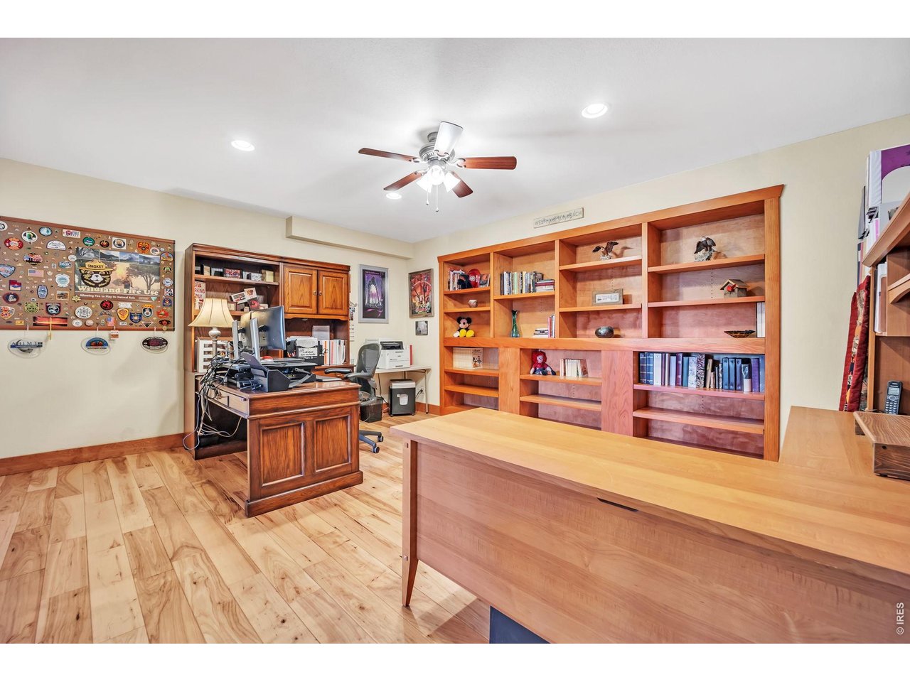 3237 Romnes Road Fort Garland, CO 81133 - Photo 32 of 42 a living room with stainless steel appliances kitchen island granite countertop a refrigerator cabinets and furniture