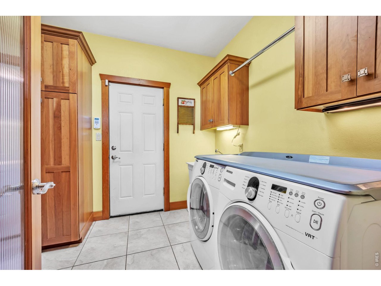 3237 Romnes Road Fort Garland, CO 81133 - Photo 36 of 42 a view of a kitchen with washer and dryer
