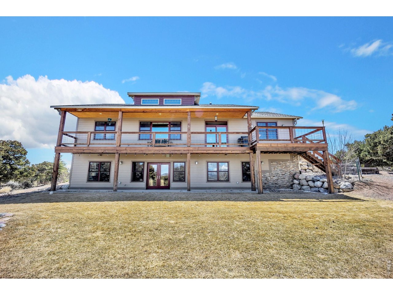 3237 Romnes Road Fort Garland, CO 81133 - Photo 4 of 42 a large building with an outdoor space