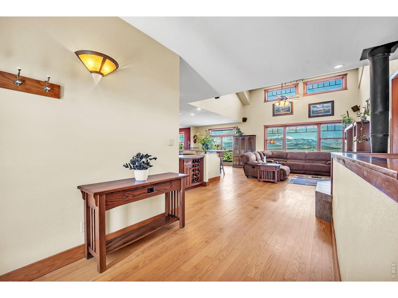3237 Romnes Road Fort Garland, CO 81133 - Photo 6 of 42 a living room with furniture and a flat screen tv