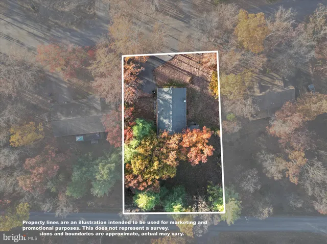 an aerial view of a house with a outdoor space