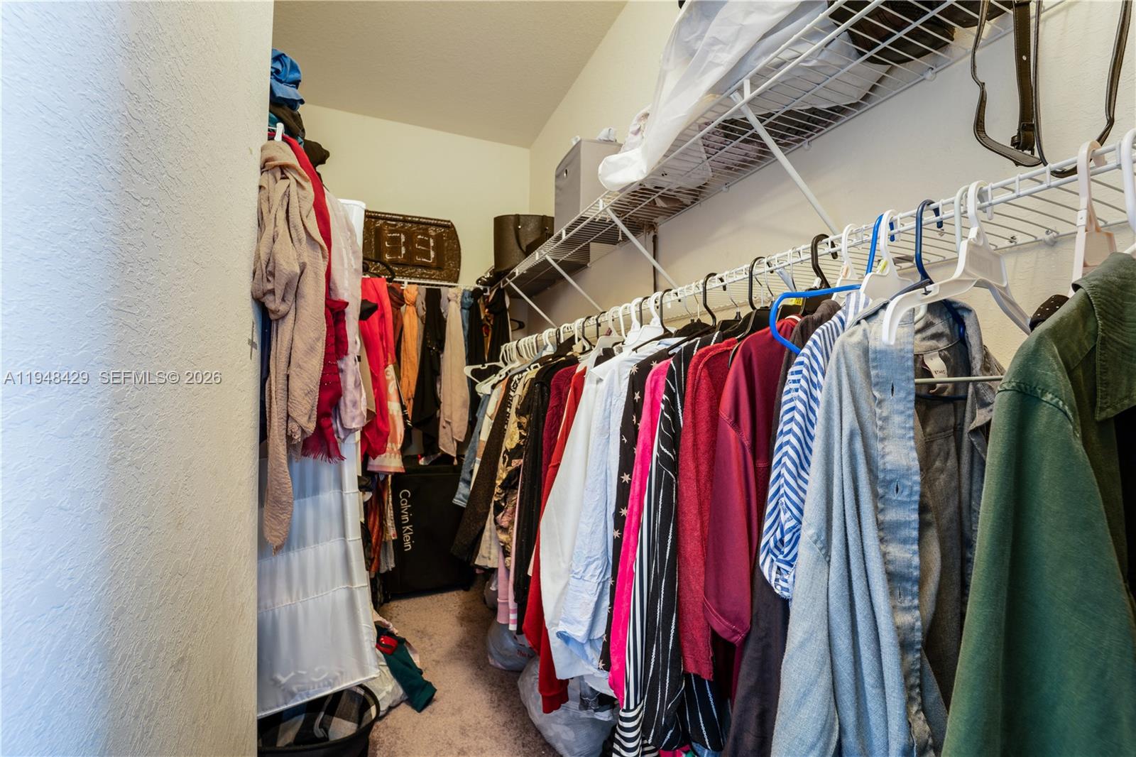 9360 Southwest 171st Court Miami, FL 33196 - Photo 25 of 43 a view of a walk in closet