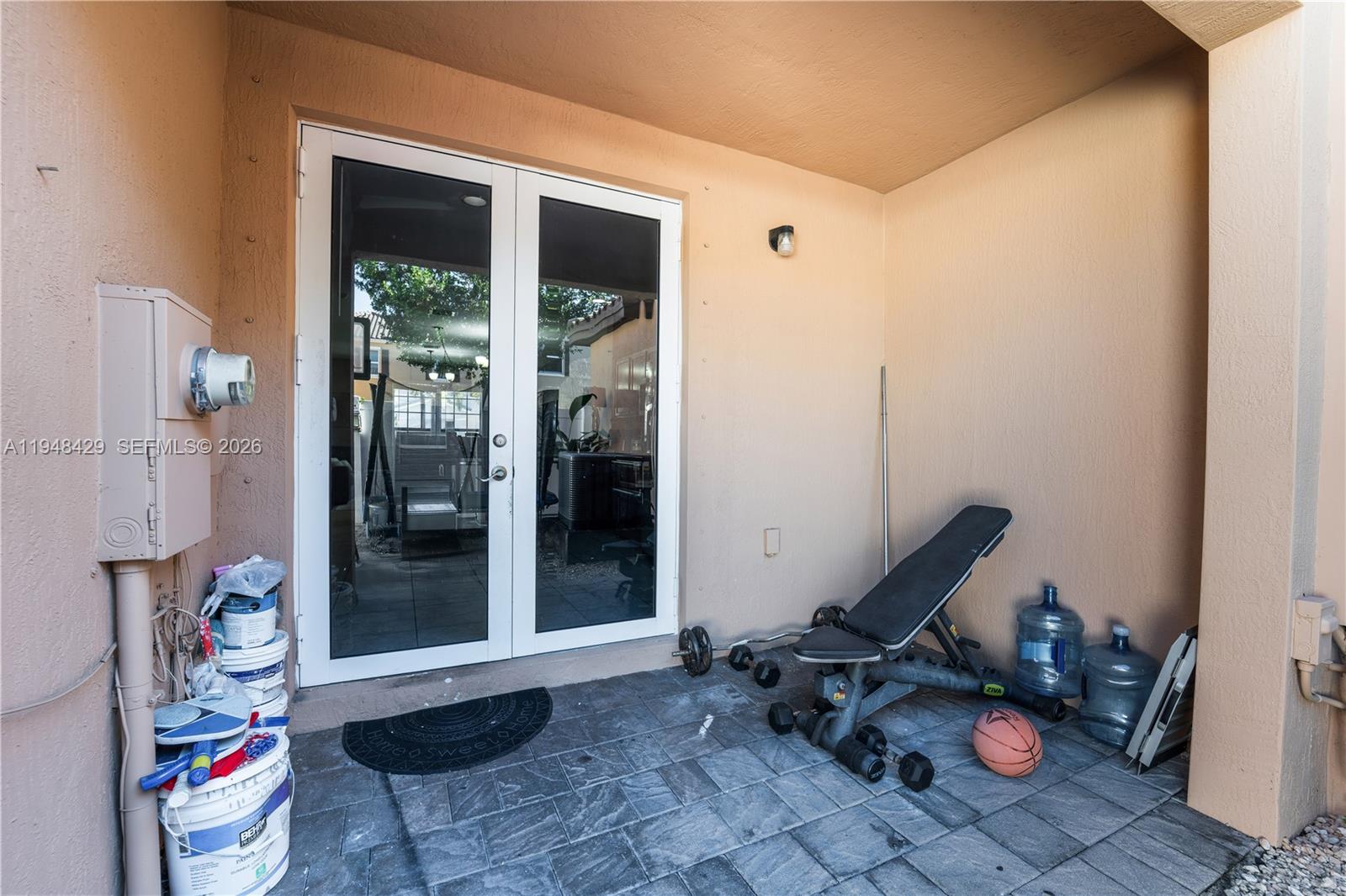 9360 Southwest 171st Court Miami, FL 33196 - Photo 31 of 43 a view of a room with gym equipment