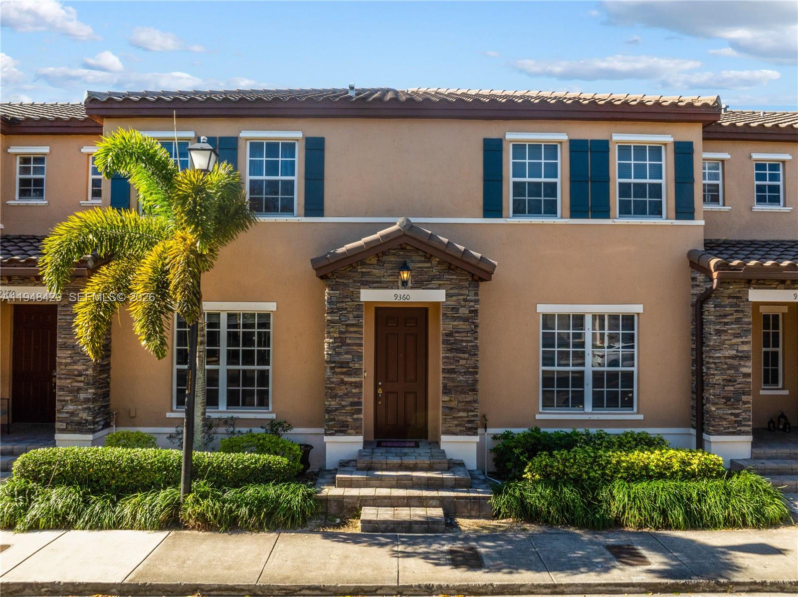 9360 Southwest 171st Court Miami, FL 33196 - Photo 36 of 43 front view of a house