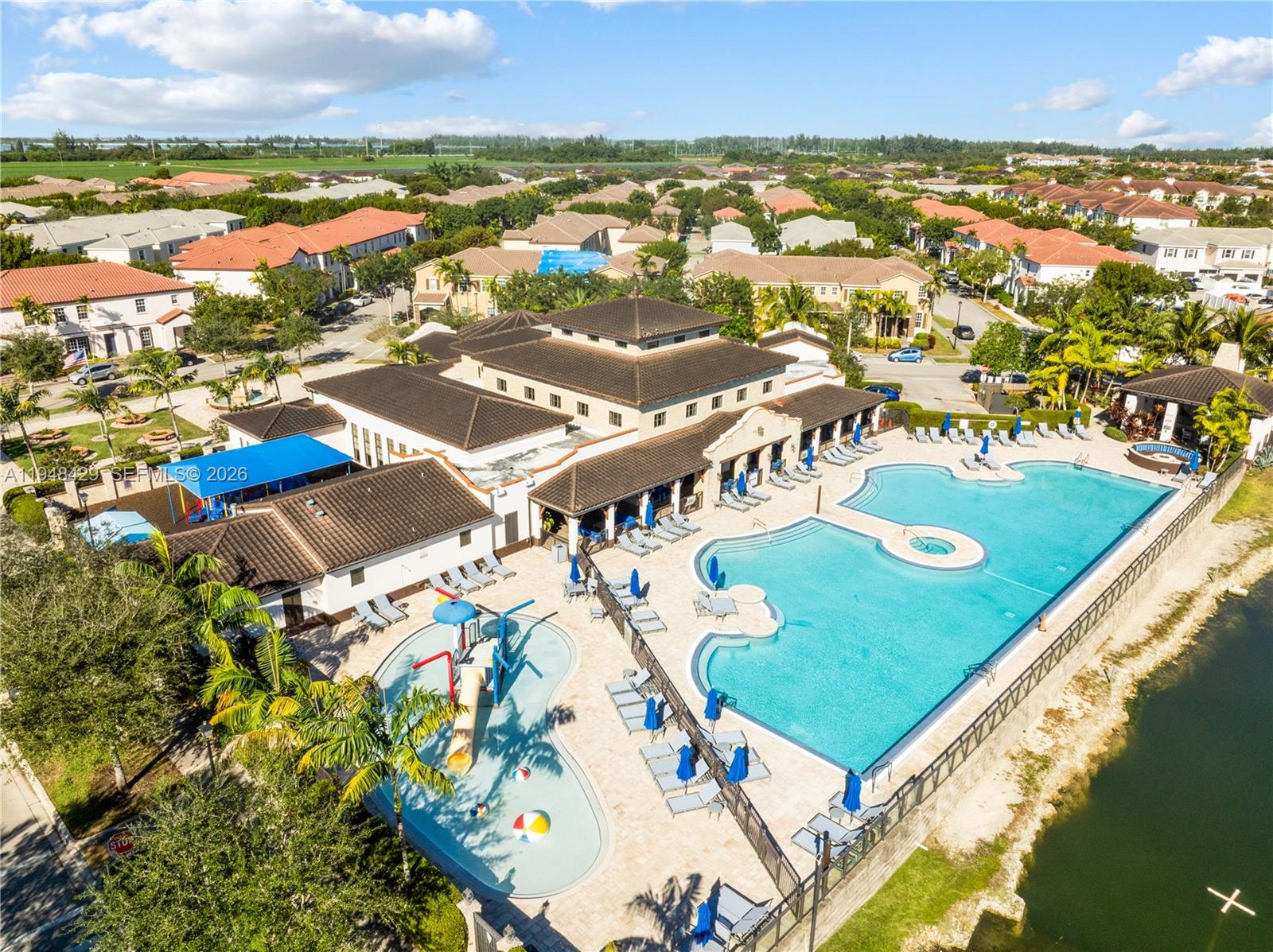 9360 Southwest 171st Court Miami, FL 33196 - Photo 38 of 43 an aerial view of residential houses with outdoor space