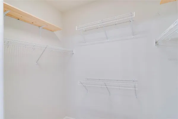 a view of a room with racks on the wall