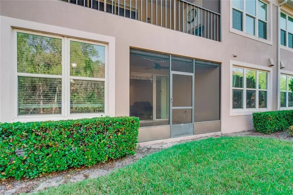 a view of an house with backyard space and garden