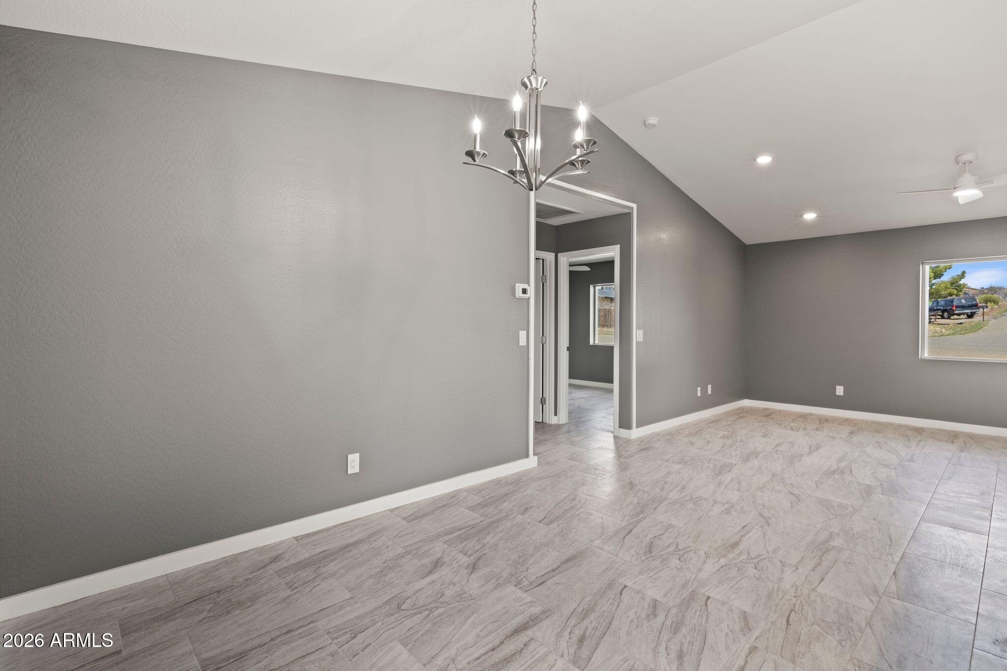 17933 East Bob White Road Mayer, AZ 86333 - Photo 16 of 30 a view of a chandelier in big room and chandelier