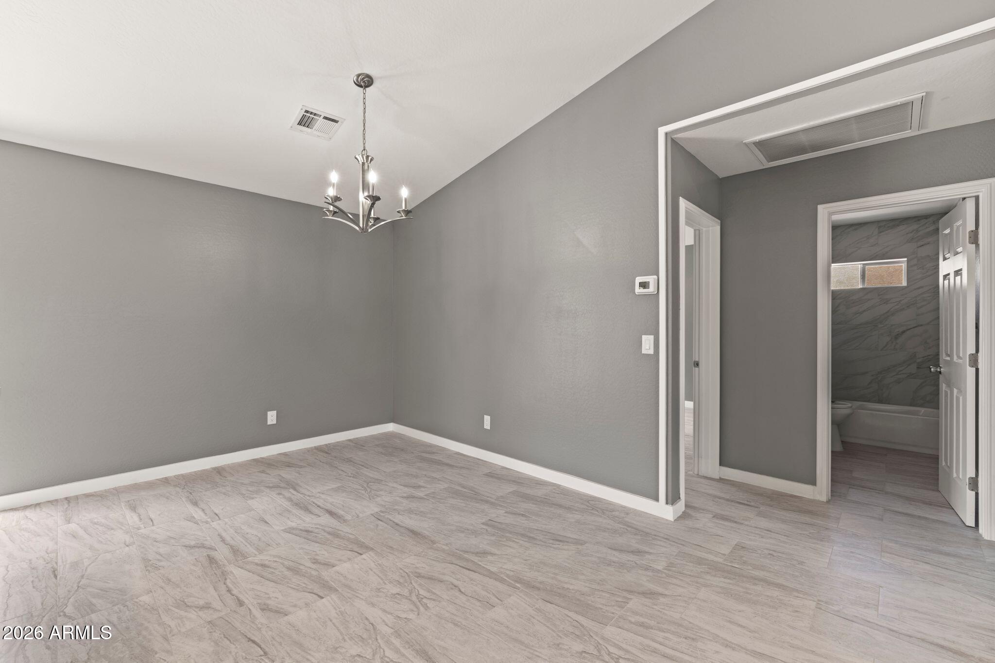 17933 East Bob White Road Mayer, AZ 86333 - Photo 19 of 30 a view of a chandelier in big room and hallway