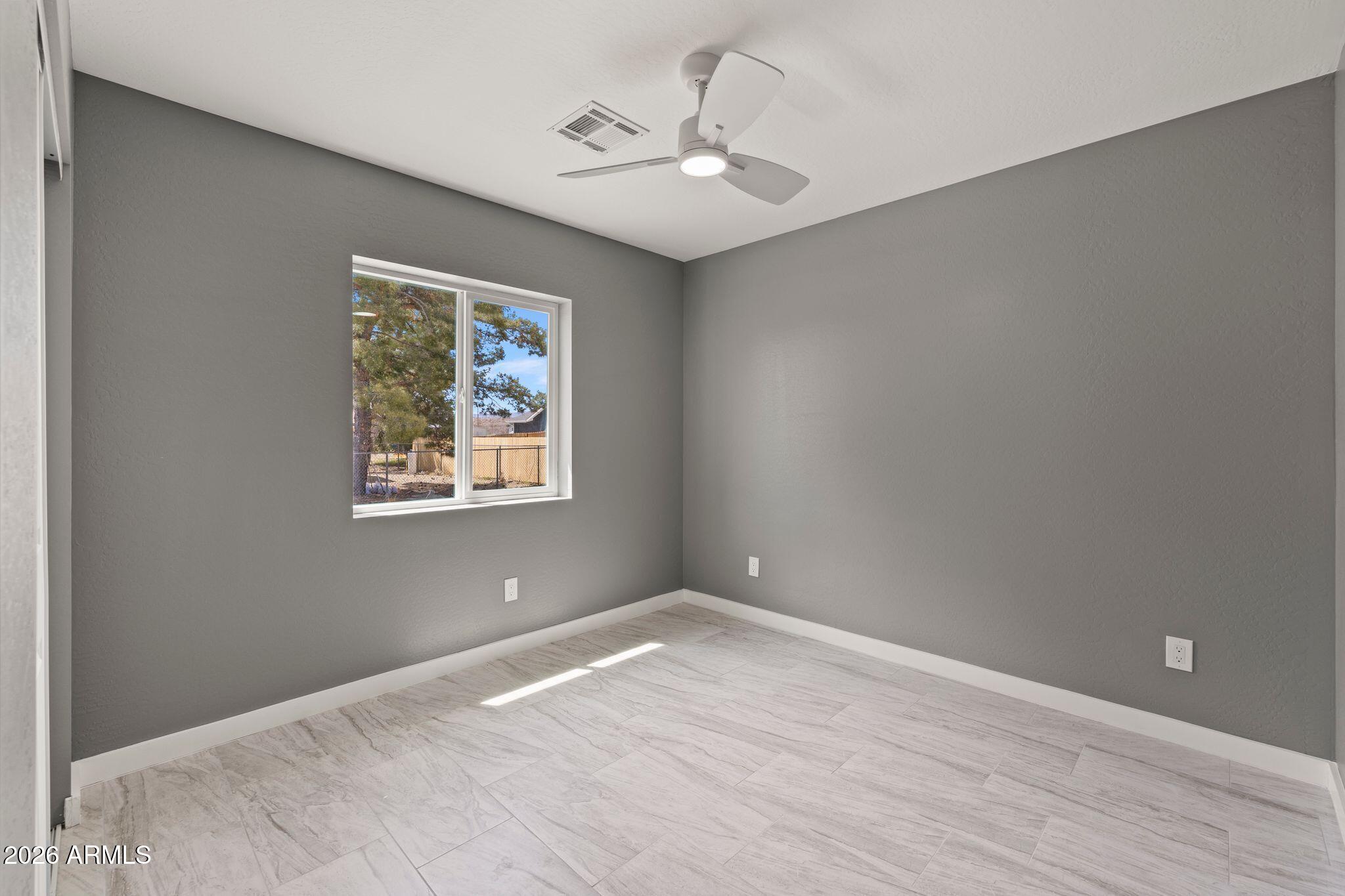 17933 East Bob White Road Mayer, AZ 86333 - Photo 27 of 30 a view of an empty room with a window