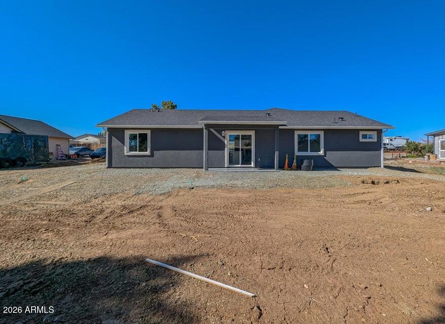 17933 East Bob White Road Mayer, AZ 86333 - Photo 30 of 30 a front view of a house with a yard