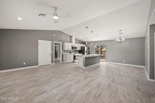 a view of kitchen with wooden floor