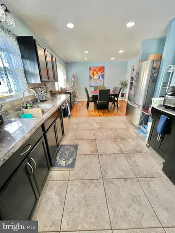 a bedroom with bed and window