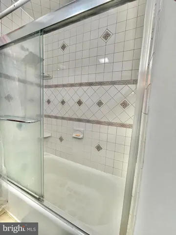 a living room with furniture and flat screen tv