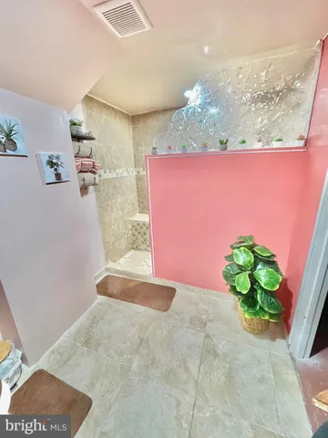 a view of a house with a yard and garage