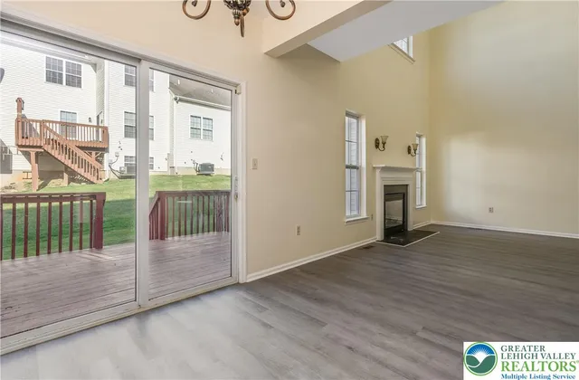 a view of livingroom with furniture and fireplace
