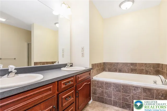 a bathroom with a sink and a bathtub