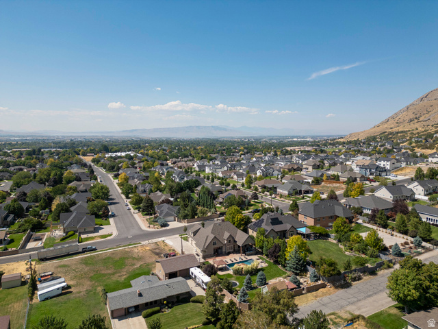 687 South 2080th Street East Springville, UT 84663 - Photo 85 of 149 Expansive aerial perspective showcasing a residential development with varied architectural styles and mature landscaping