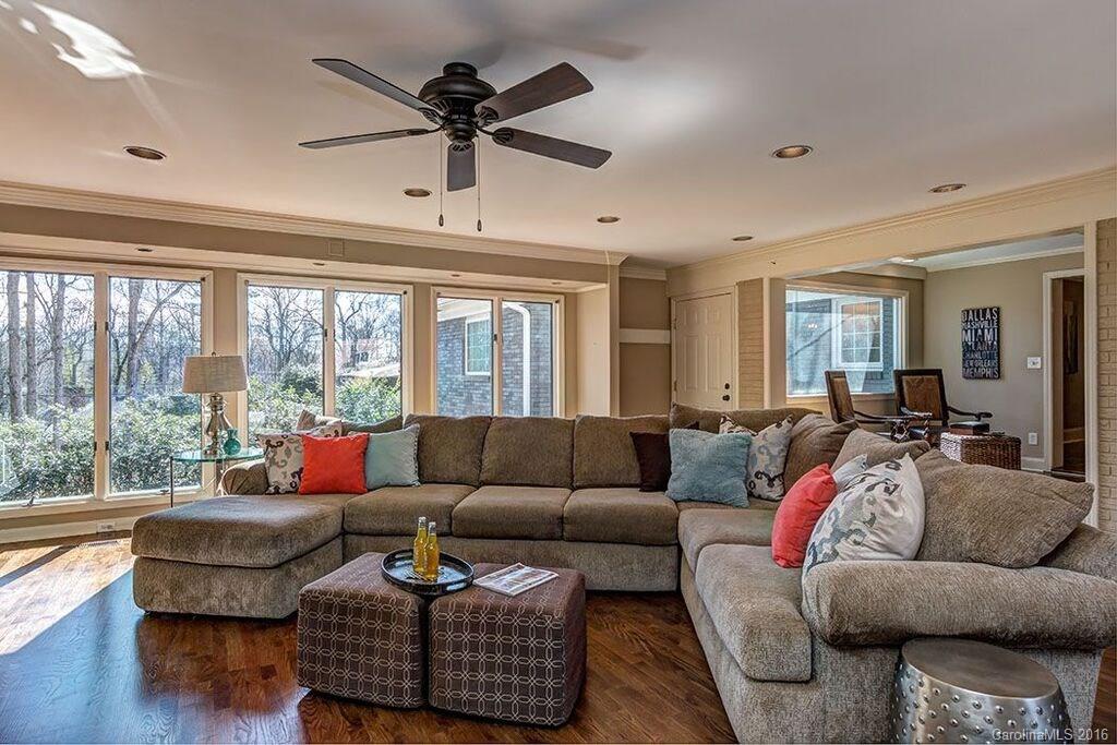 6127 Glenridge Road Charlotte, NC 28211 - Photo 17 of 24 a living room with furniture and a large window
