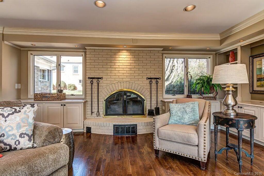 6127 Glenridge Road Charlotte, NC 28211 - Photo 18 of 24 a living room with furniture and a fireplace