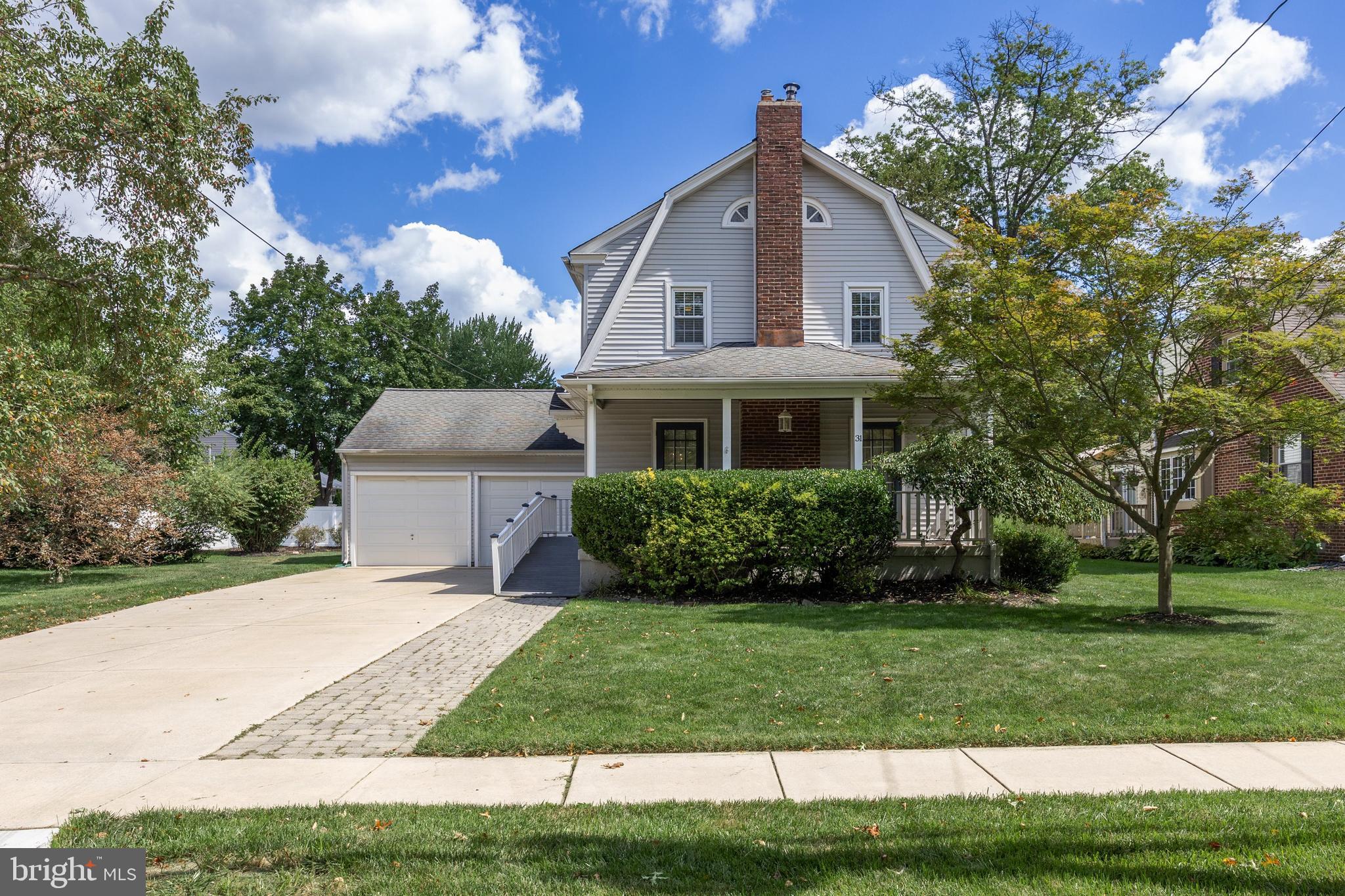 31 Wesley Avenue Cherry Hill, NJ 08002 - Photo 1 of 52 a front view of a house with a yard