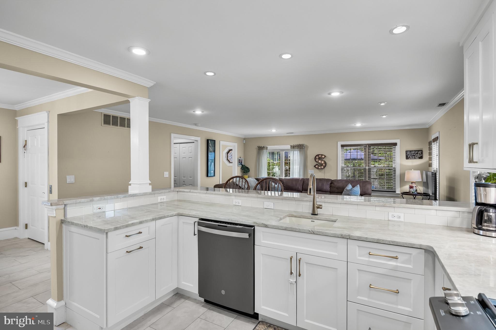 31 Wesley Avenue Cherry Hill, NJ 08002 - Photo 15 of 52 a kitchen with sink and view living room