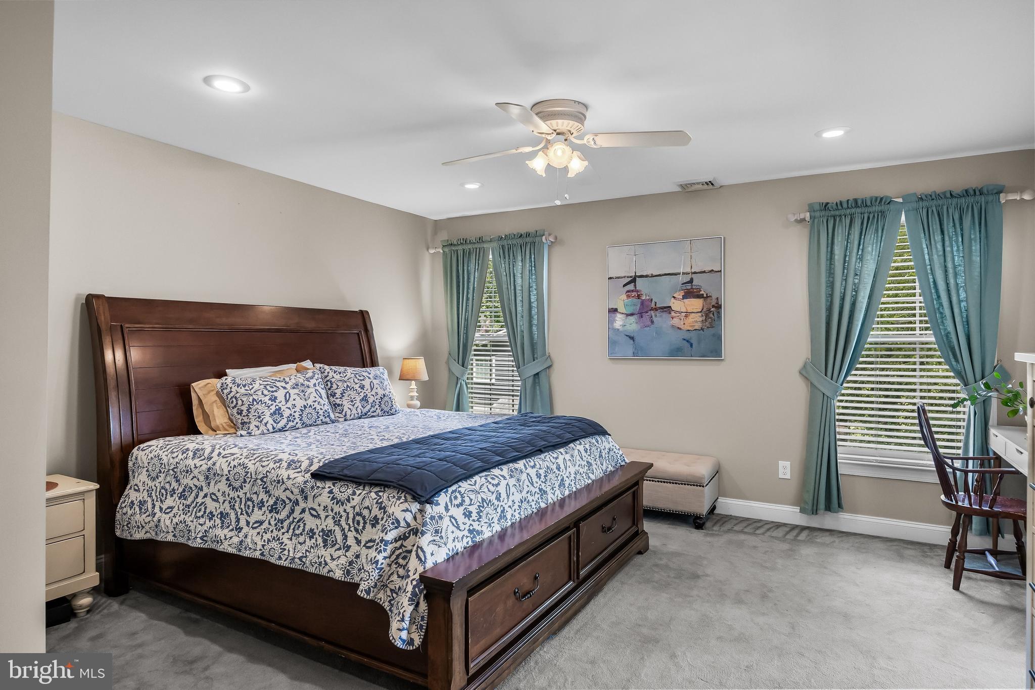 31 Wesley Avenue Cherry Hill, NJ 08002 - Photo 22 of 52 a bedroom with a bed and a chandelier