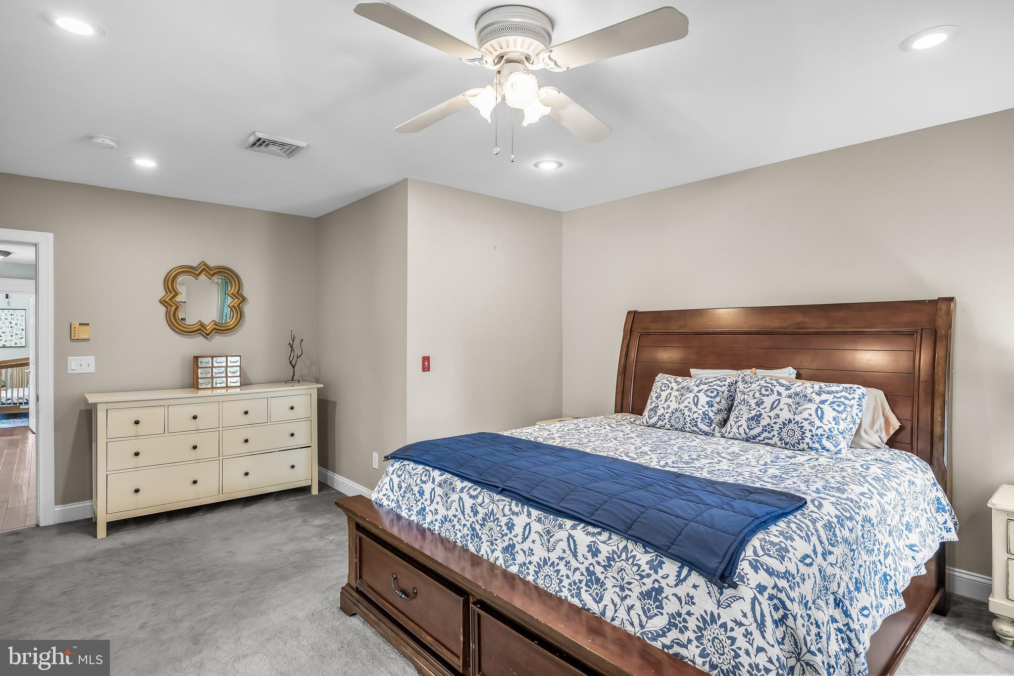 31 Wesley Avenue Cherry Hill, NJ 08002 - Photo 23 of 52 a bedroom with a bed and a chandelier