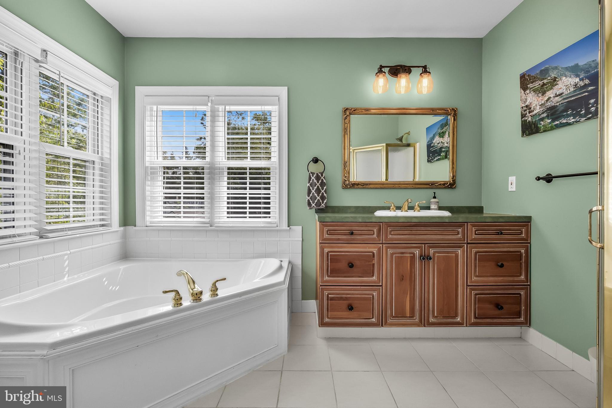 31 Wesley Avenue Cherry Hill, NJ 08002 - Photo 25 of 52 a spacious bathroom with a bathtub and a window