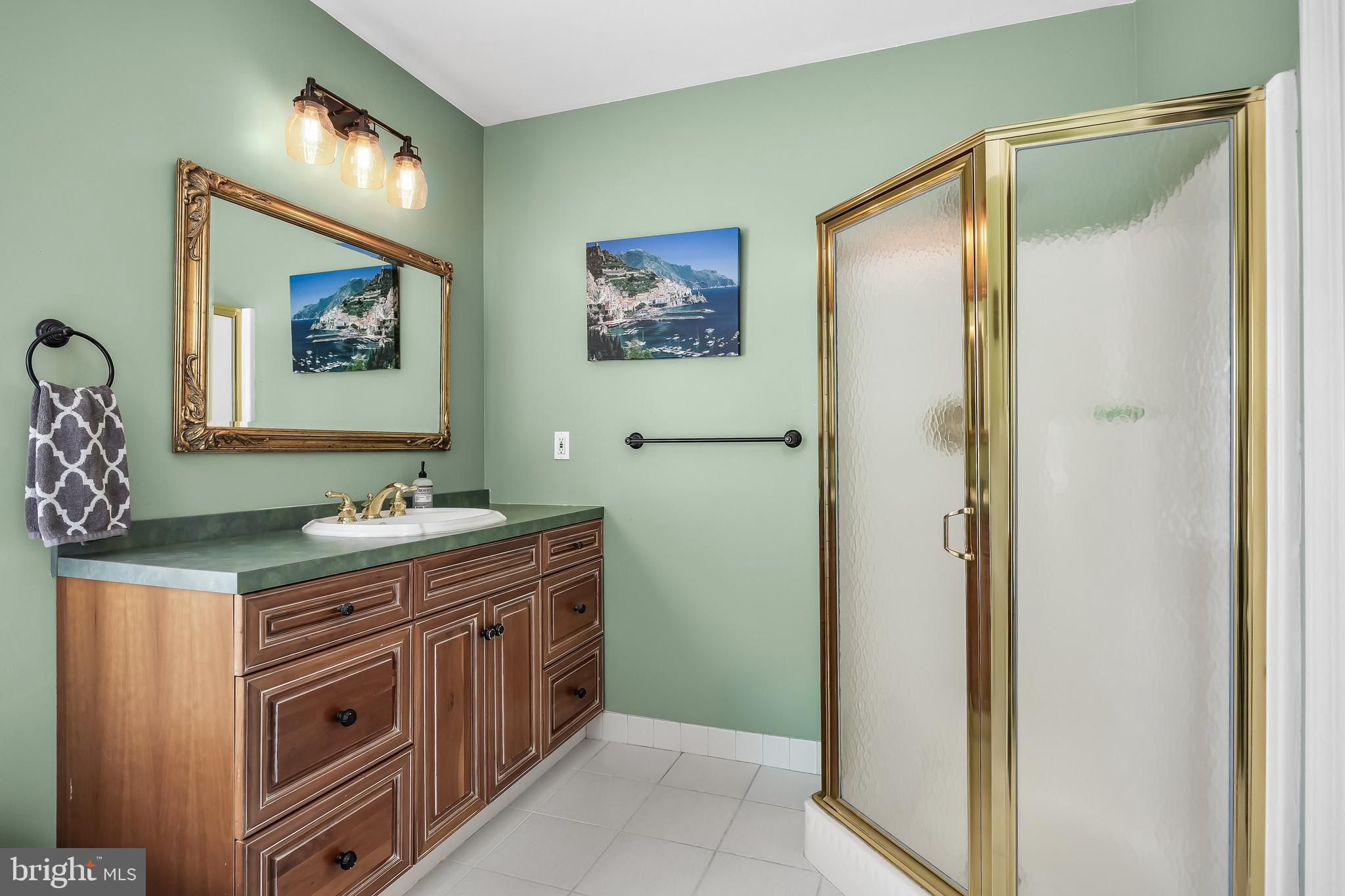 31 Wesley Avenue Cherry Hill, NJ 08002 - Photo 26 of 52 a view of cabinets and a refrigerator in a kitchen