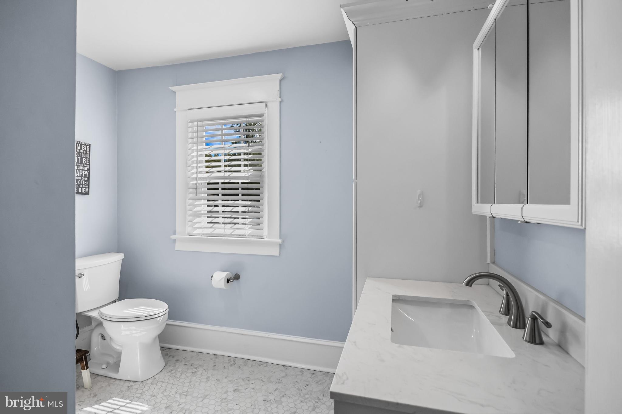 31 Wesley Avenue Cherry Hill, NJ 08002 - Photo 28 of 52 a bathroom with a toilet sink and mirror