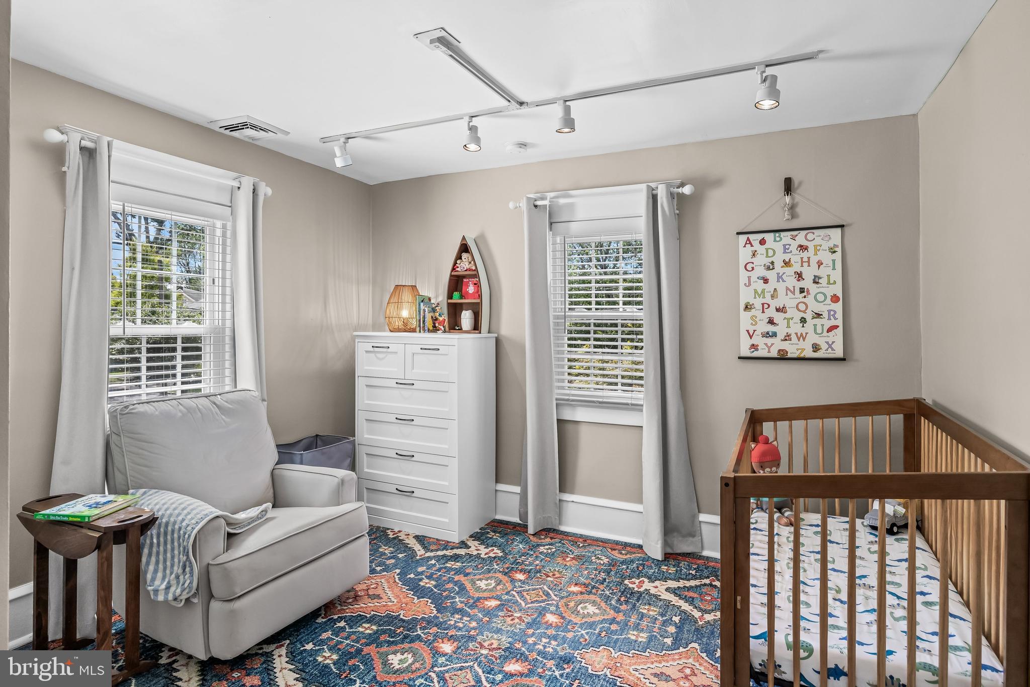 31 Wesley Avenue Cherry Hill, NJ 08002 - Photo 31 of 52 a living room with furniture and a baby crib