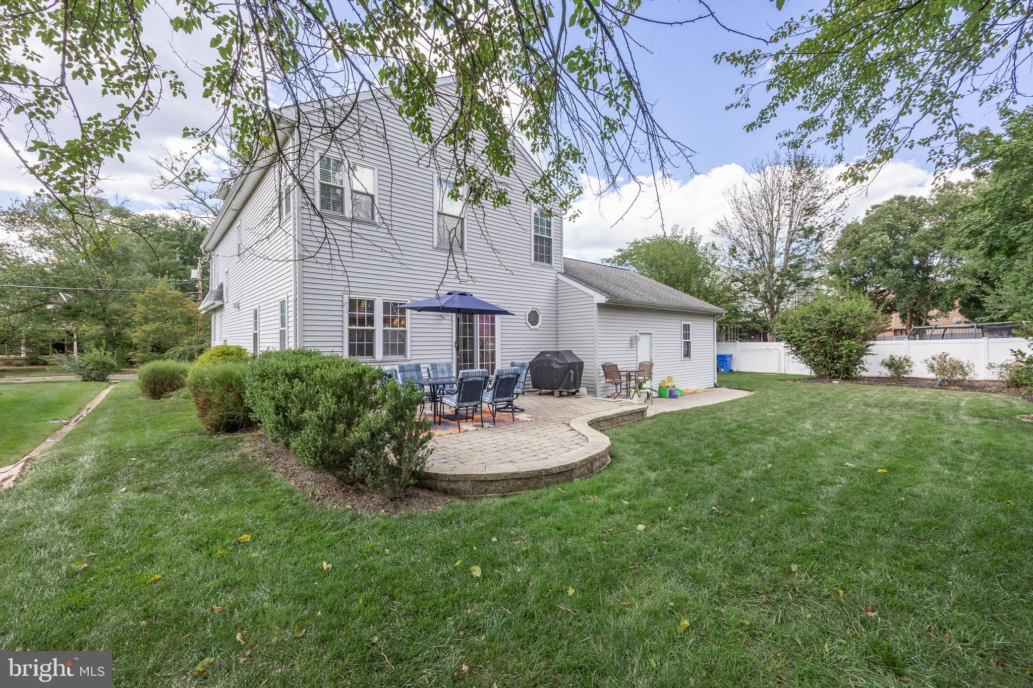 31 Wesley Avenue Cherry Hill, NJ 08002 - Photo 35 of 52 a view of a house with backyard sitting area and garden