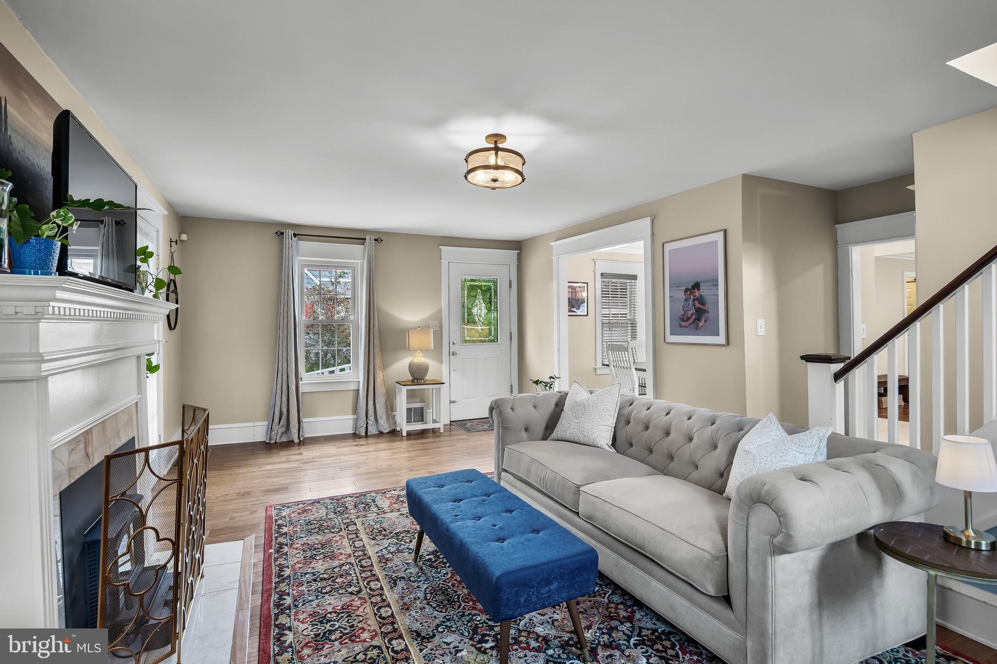 31 Wesley Avenue Cherry Hill, NJ 08002 - Photo 8 of 52 a living room with furniture and a fireplace