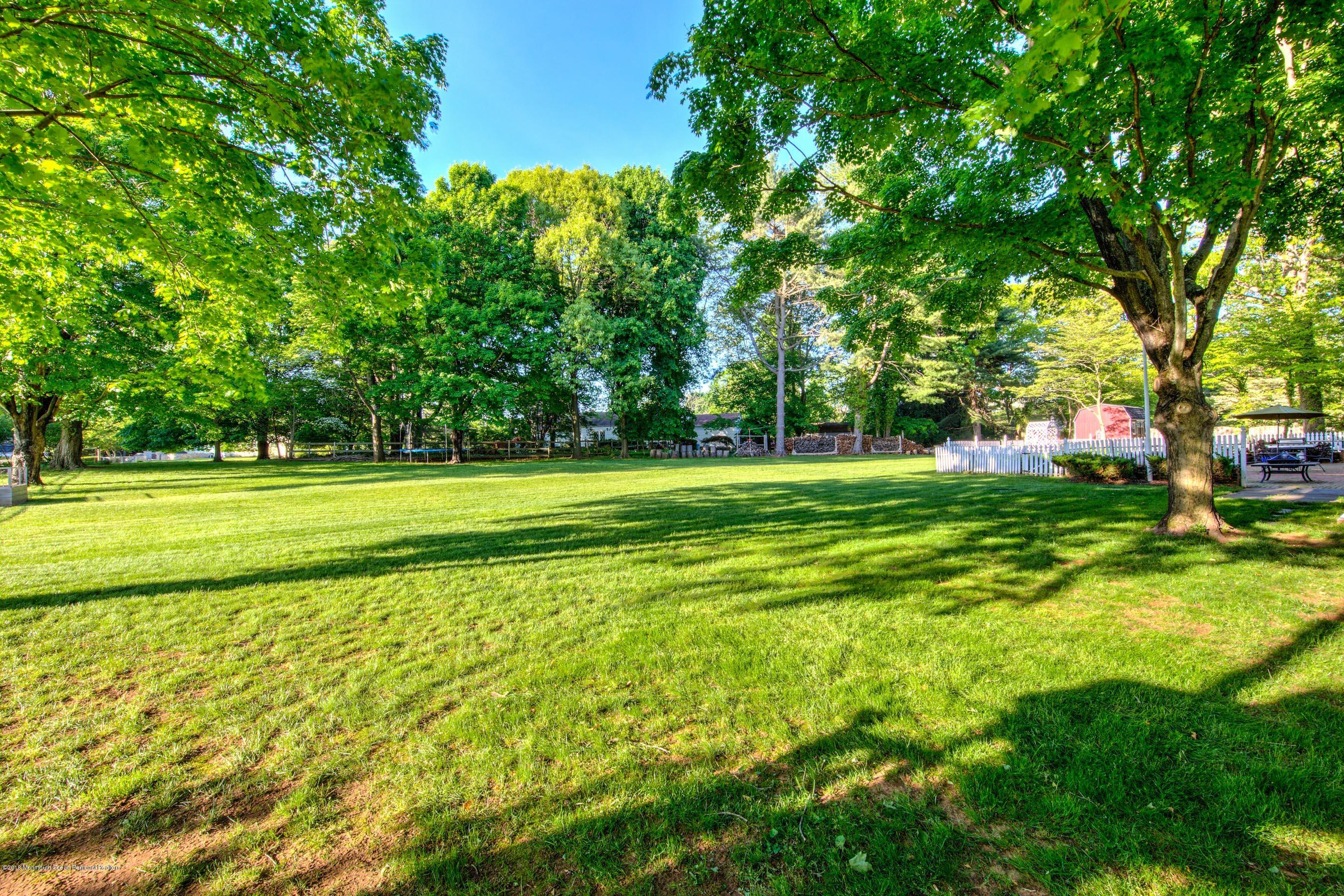 150 Cedar Drive Colts Neck, NJ 07722 - Photo 42 of 45 150CedarExteriorOnline-1018