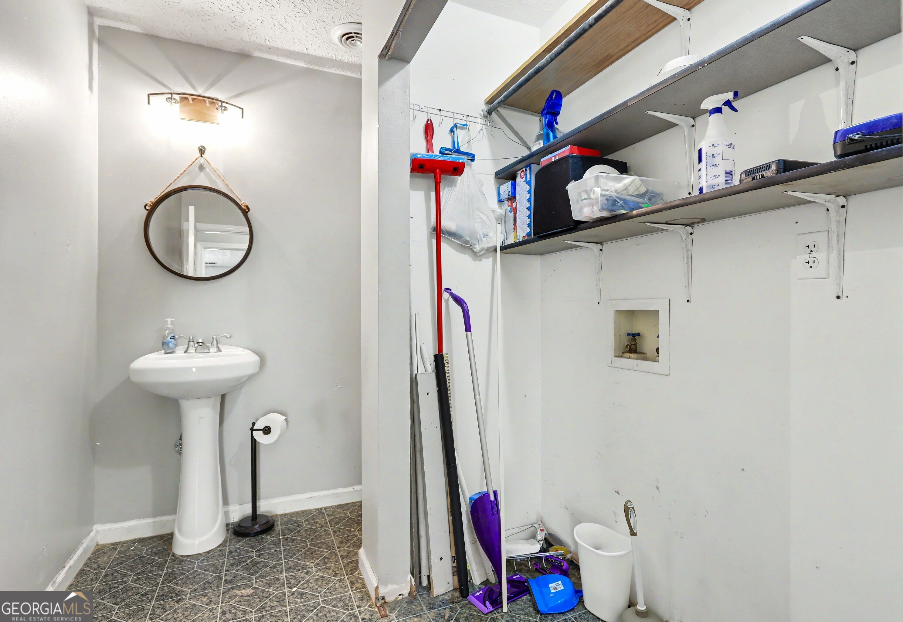 376 Doe Lane Mansfield, GA 30055 - Photo 22 of 28 a bathroom with a sink toilet and a mirror
