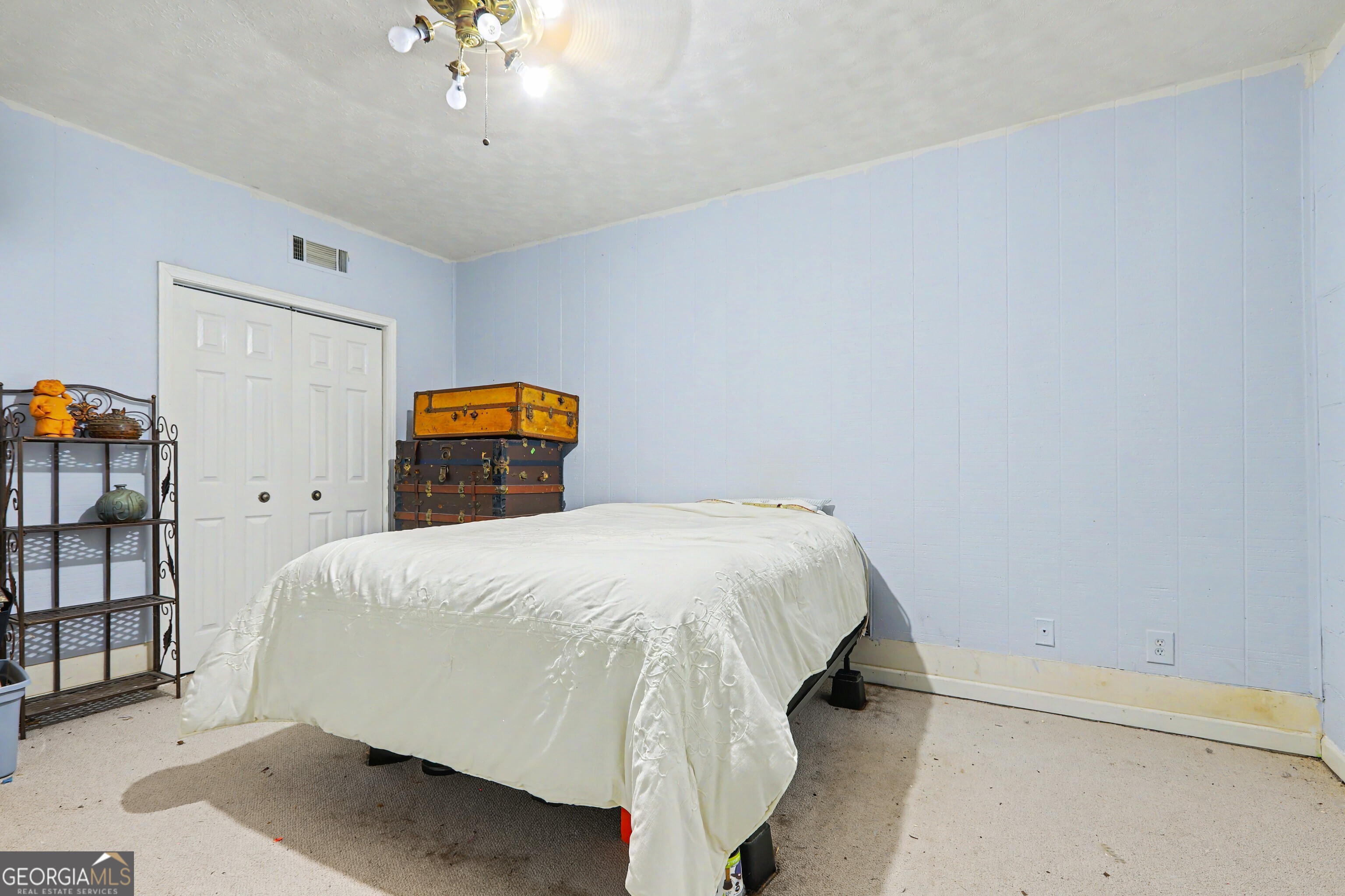 376 Doe Lane Mansfield, GA 30055 - Photo 27 of 28 a bedroom with a bed and window