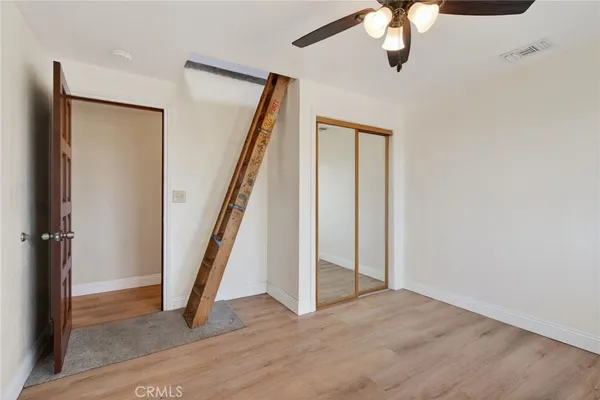 a view of an entryway with hardwood