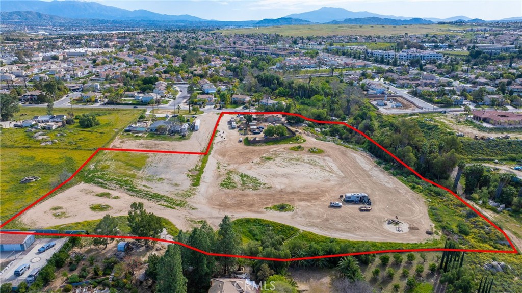 14435 Wood Road Riverside, CA 92508 - Photo 2 of 66 an aerial view of residential houses with outdoor space and lake view