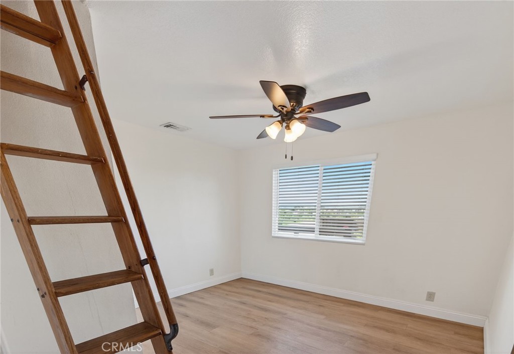 14435 Wood Road Riverside, CA 92508 - Photo 21 of 66 a view of an entryway with wooden floor