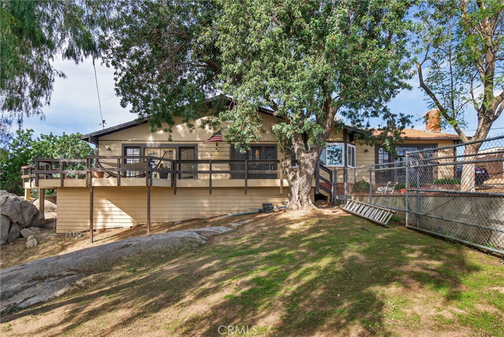 14435 Wood Road Riverside, CA 92508 - Photo 38 of 66 a view of a house with pool and sitting area