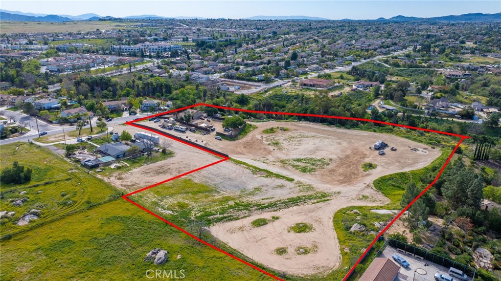 14435 Wood Road Riverside, CA 92508 - Photo 57 of 66 an aerial view of residential houses with outdoor space and swimming pool