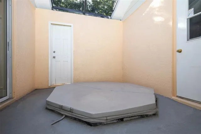 wooden floor and window in an empty room