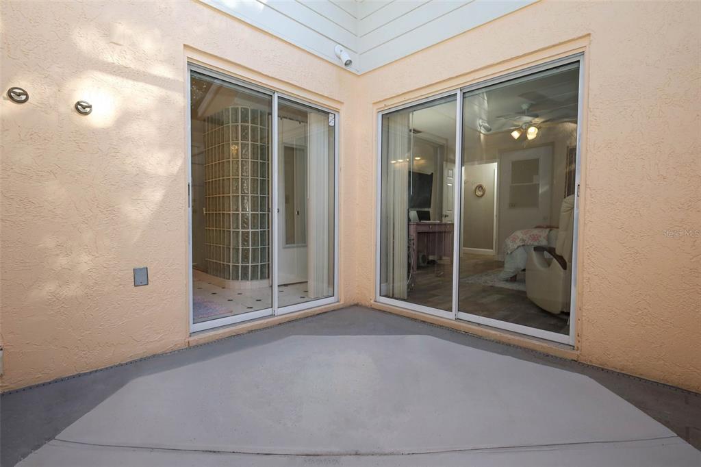 1531 Lawndale Circle Winter Park, FL 32792 - Photo 20 of 44 wooden floor and window in an empty room