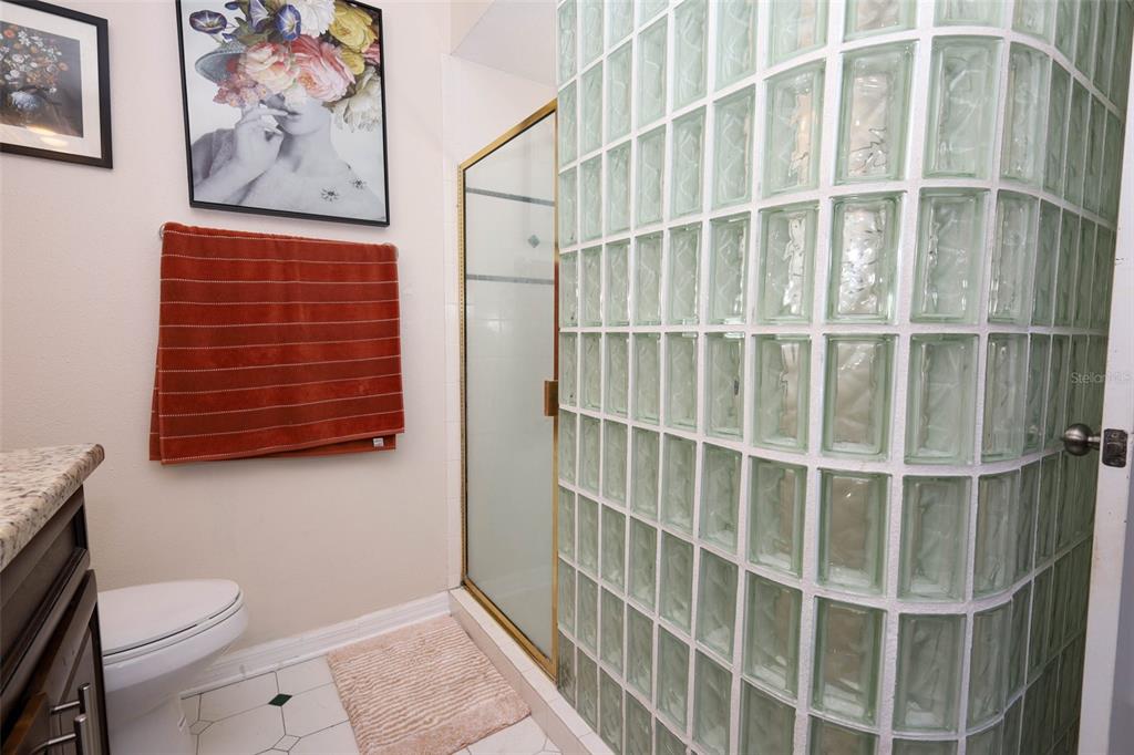 1531 Lawndale Circle Winter Park, FL 32792 - Photo 22 of 44 a bathroom with a toilet and a shower